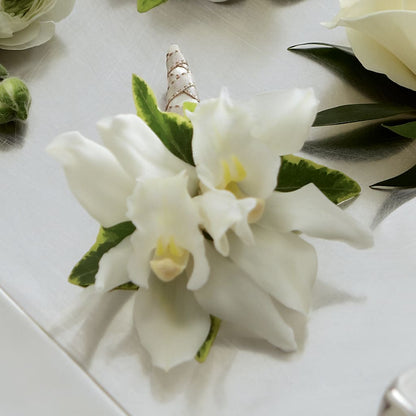 White Mini Cymbidium Boutonniere – HORTENSIA'S FLOWERS, Carlsbad CA